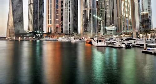 Skyscrapers and yachts in KIZAD Free Zone area showcasing vibrant business opportunities and development.